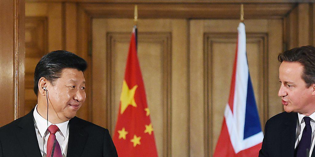 Wandel der britischen China-Politik dank Investitionen: Premier David Cameron empfängt den chinesischen Präsidenten Xi Jinping in London. (Archiv) Wandel der britischen China-Politik dank Investitionen: Premier David Cameron empfängt den chinesischen Präsidenten Xi Jinping in London. (Archiv)