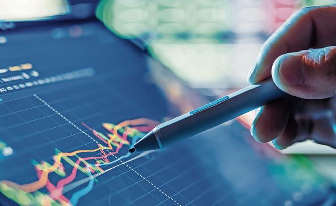 Businessman use tablet and smart phone for Stock Market
