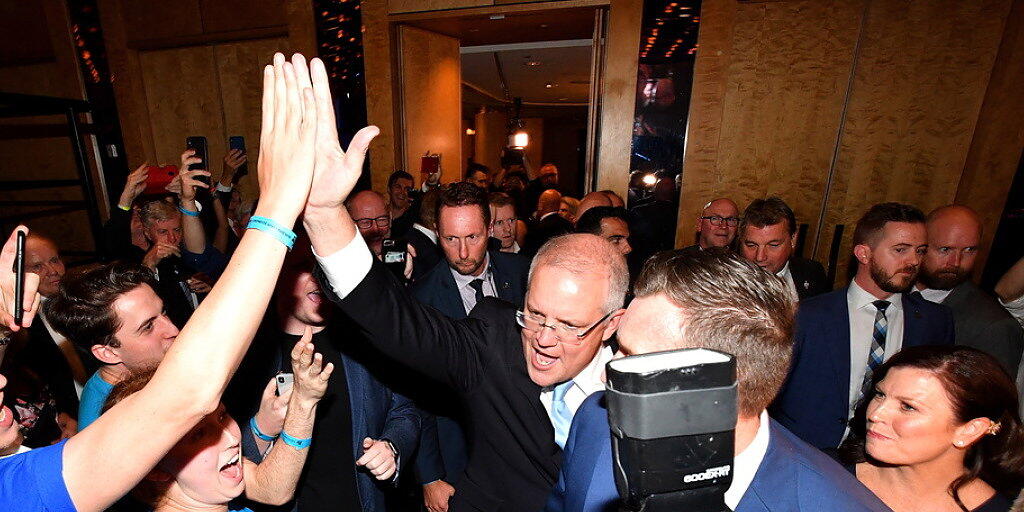 Australiens konservativer Premierminister Scott Morrison feiert seinen Wahlsieg. Australiens konservativer Premierminister Scott Morrison feiert seinen Wahlsieg.
