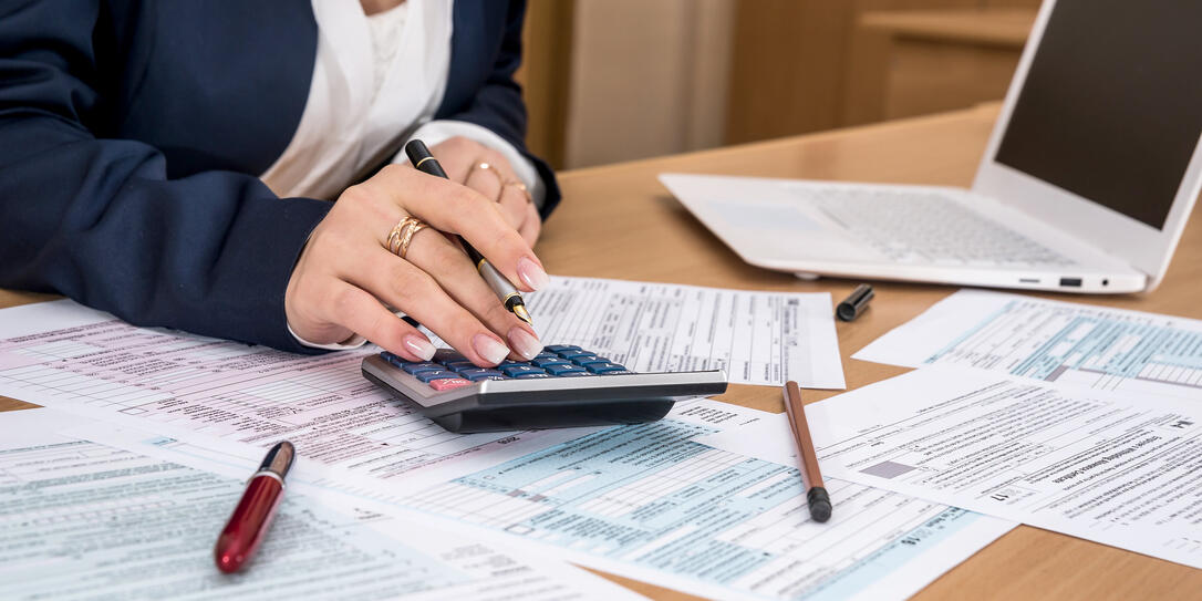 Woman filling US tax form