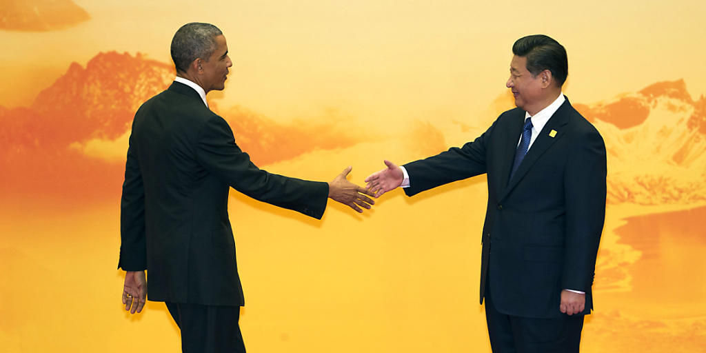 Ein grosser Schritt, damit das UNO-Klimavertrag in Kraft tritt: Obama (l.) und Xi übergaben der UNO die nötigen Dokumente, damit ihre Länder dem Abkommen beitreten. (Archiv) Ein grosser Schritt, damit das UNO-Klimavertrag in Kraft tritt: Obama (l.) und Xi übergaben der UNO die nötigen Dokumente, damit ihre Länder dem Abkommen beitreten. (Archiv)