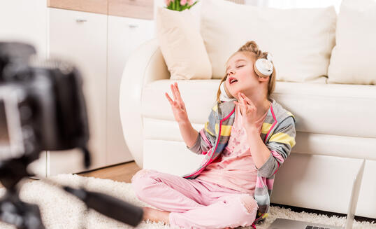 Little girl recording video