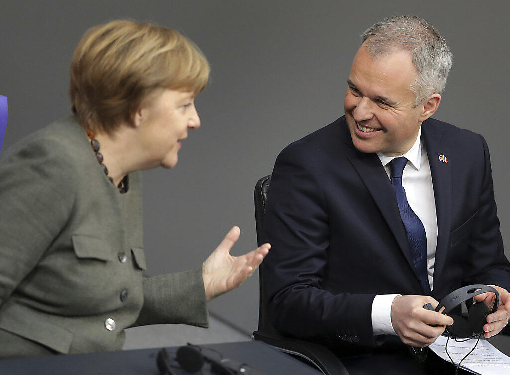 Die deutsche Bundeskanzlerin Angela Merkel und der französische Parlamentspräsident François de Rugy anlässlich der Feier zum 55. Jubiläum des Elysée-Vertrags im Reichstag in Berlin. Die deutsche Bundeskanzlerin Angela Merkel und der französische Parlamentspräsident François de Rugy anlässlich der Feier zum 55. Jubiläum des Elysée-Vertrags im Reichstag in Berlin.