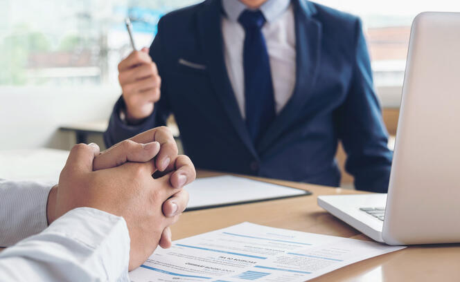 Job application interview. Executive manager hold up pen to Sign Approval, Close up of male hands, man feel worried, stressed, be nervous, Hiring concept