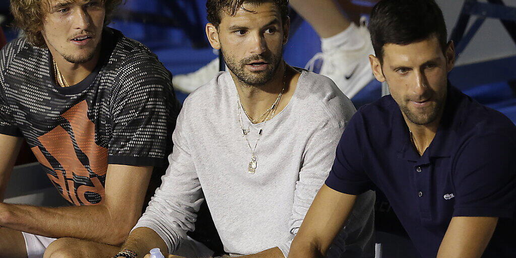 Grigor Dimitrov (Mitte) hatte sich im Juni bei der Adria Tour mit dem Coronavirus infiziert