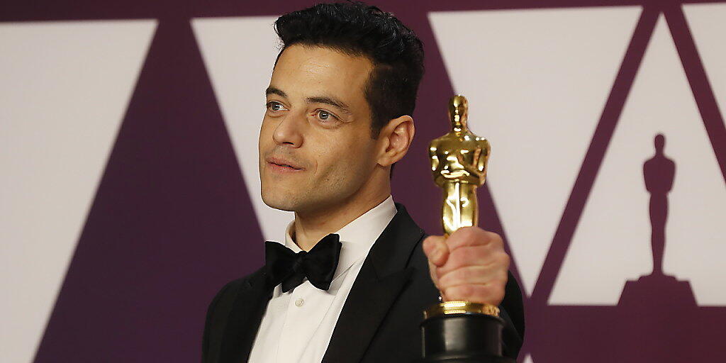 Oscar-Gewinner Rami Malek soll mitten in Verhandlungen um die Rolle von James Bonds neuem Gegenspieler stecken - dies zumindest berichten US-Medien. (KEYSTONE/EPA/ETIENNE LAURENT)