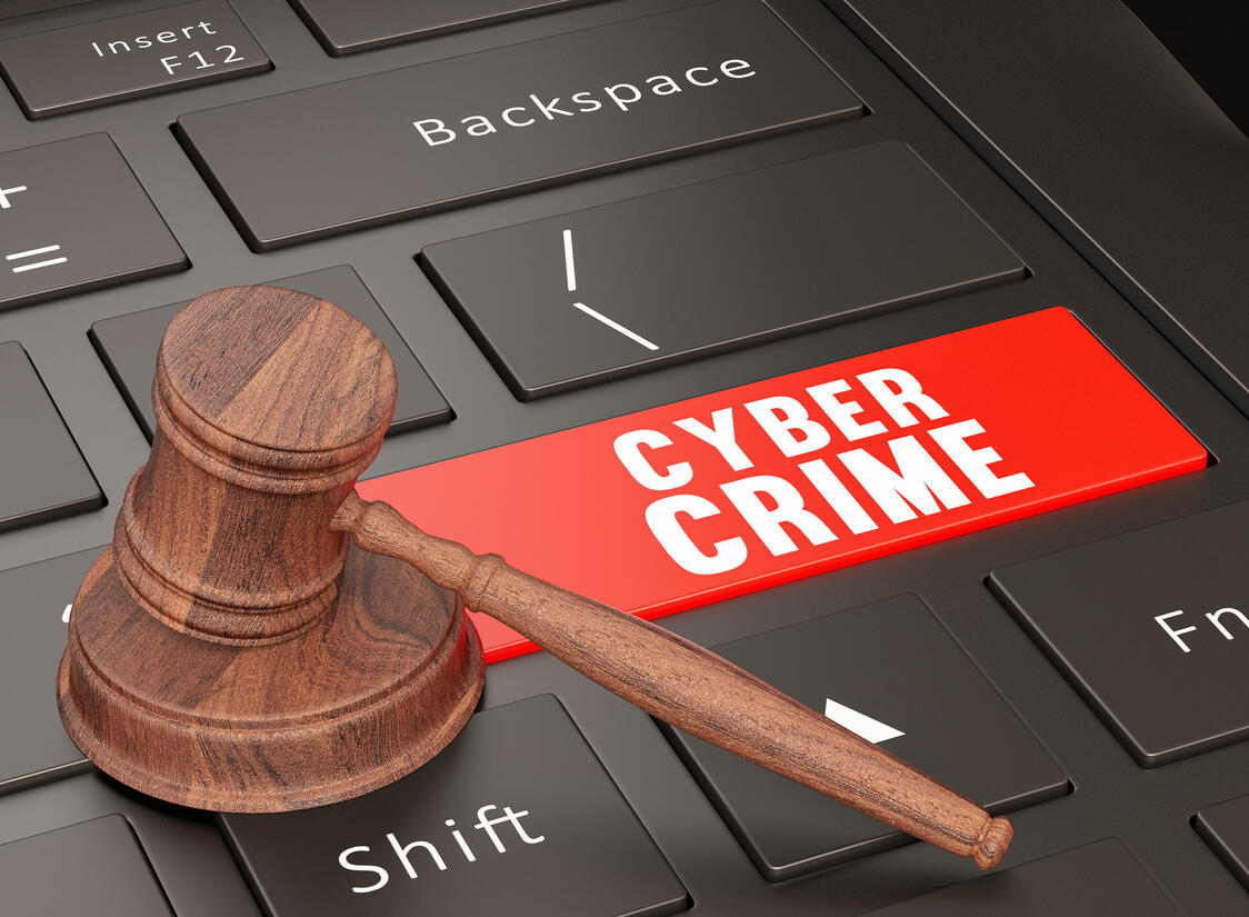 Cyber Crime Justice Concept with Laptop and Gavel Cyber Crime Justice Concept with Laptop and Gavel